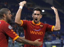 AS Roma's Borriello celebrates with teammate Adriano after scoring against CFR Cluj during their Champions League Group E soccer match at the Olympic stadium in Rome