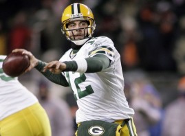 Green Bay Packers quarterback Aaron Rodgers looks to throw downfield against the Chicago Bears in the fourth quarter of their NFL football game in Chicago